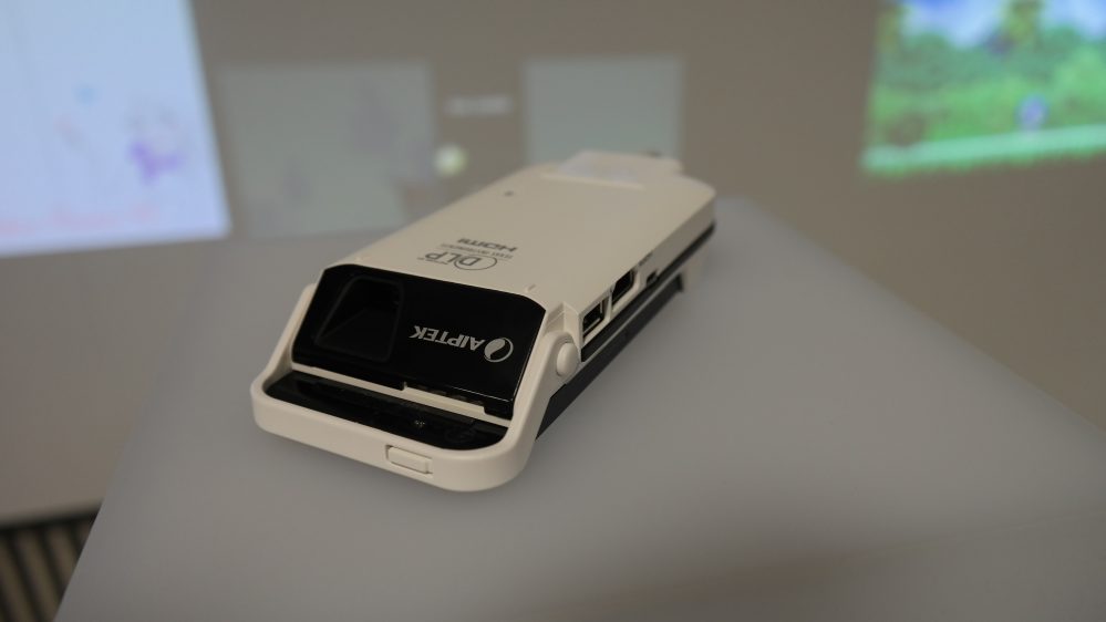 Aiptek shows off a combo projector/battery pack for iPhone 5 available starting this month