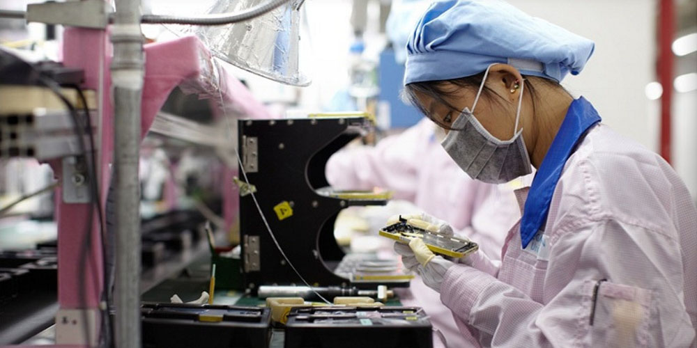 A worker on Foxconn's iPhone production line