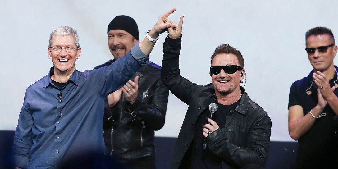 Apple Watch Apple Pay Tim Cook U2's Bono finger tap