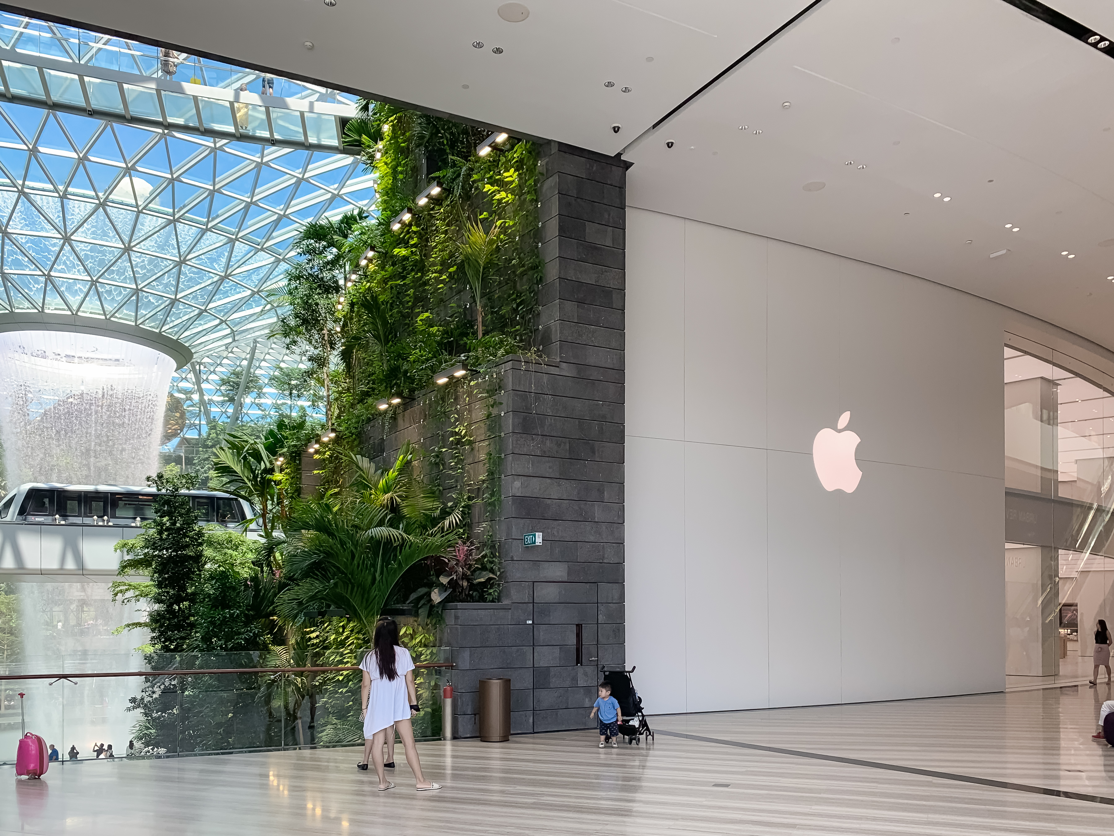 Sweeping glass facade of Apple Jewel Changi Airport unveiled in