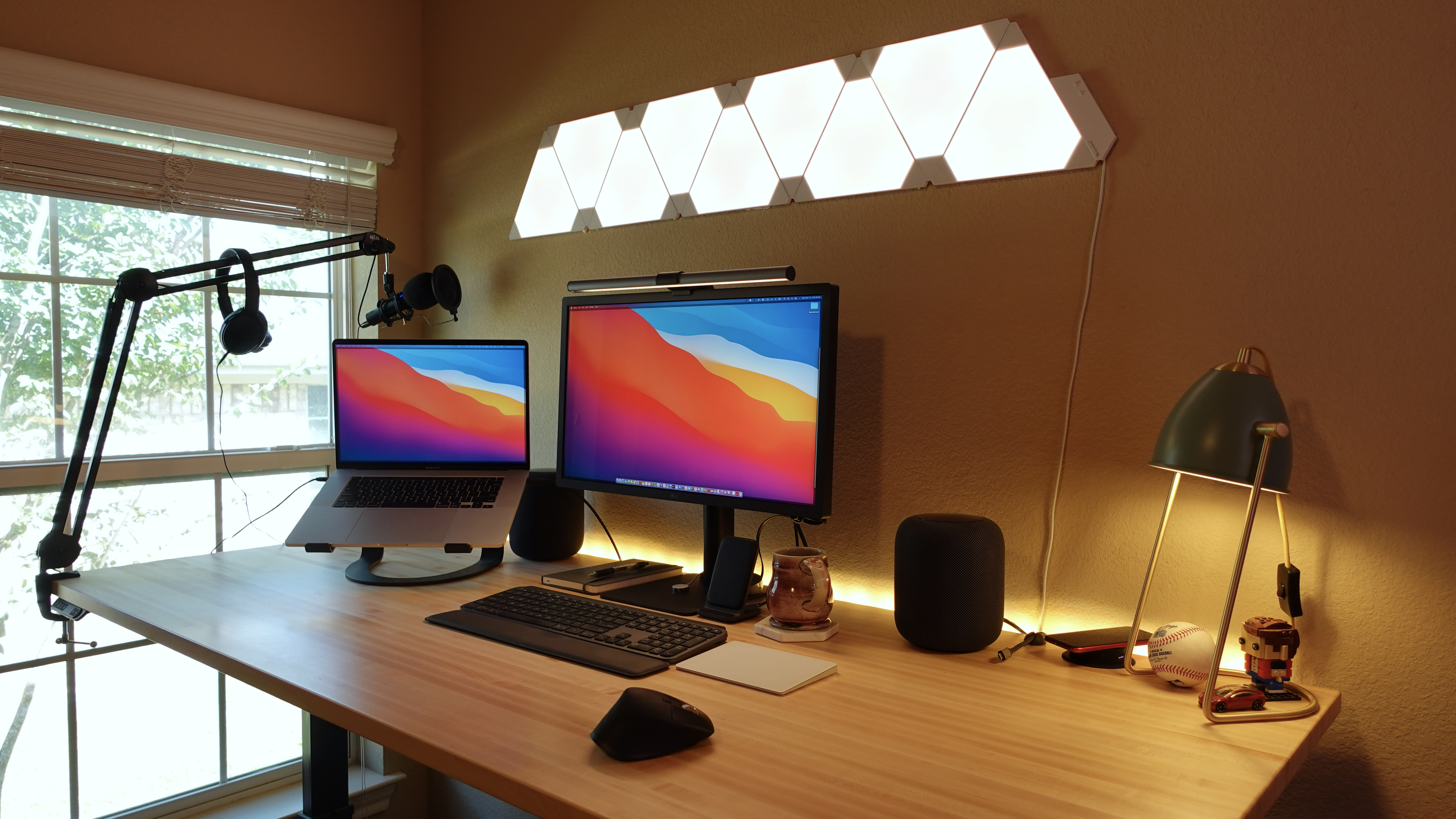 photo of Office tour — VertDesk standing desk, 16” MacBook Pro, favorite Mac apps, more image