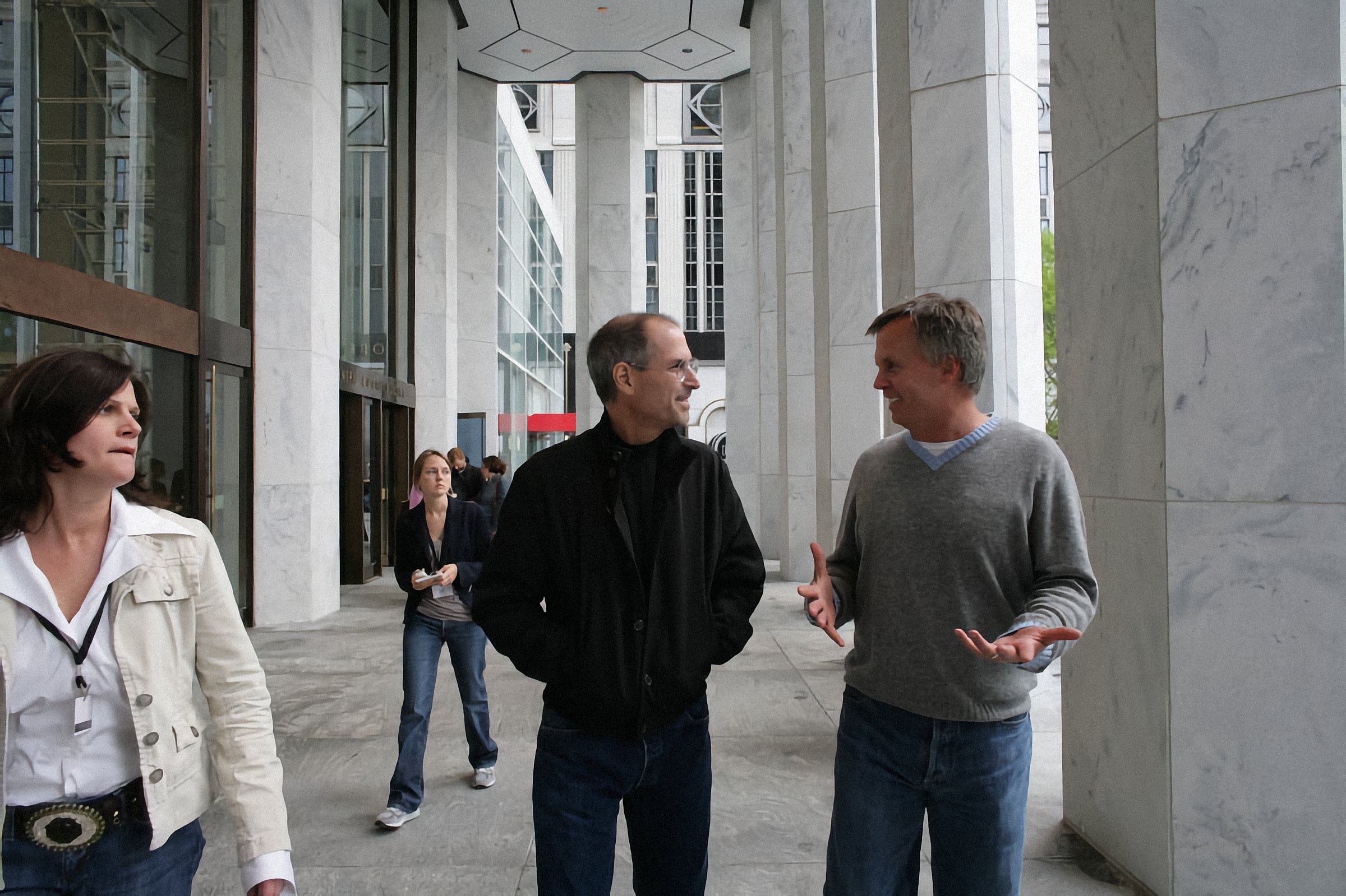 Steve Jobs and Ron Johnson walk along the GM Building on Fifth Avenue in Manhattan.