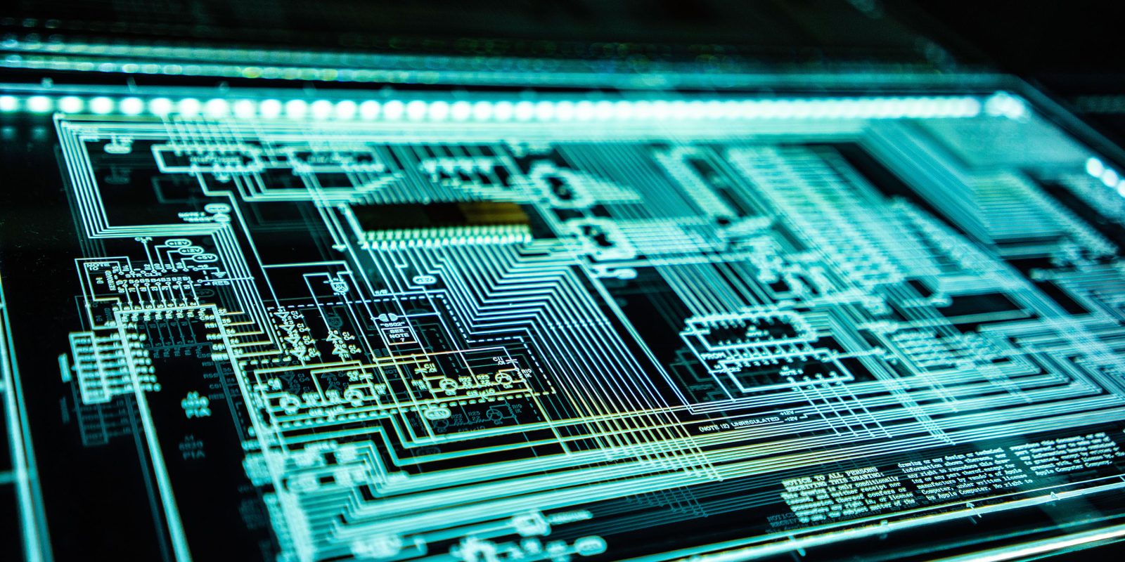 Stylised image of backlit circuit board etching | Component shortage outlook for 2022