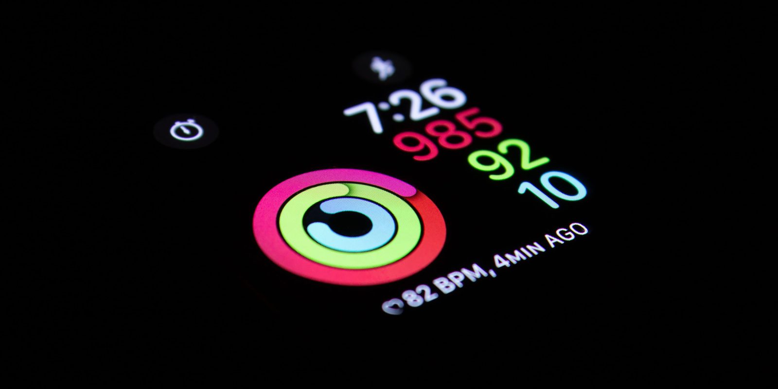 Apple Watch activity rings shown in dark room | Life Itself conference has Apple chairman and health chief in speaker line-up