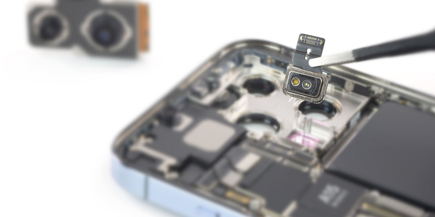 Smartphone repair law | iPhone 13 camera module held in tweezers