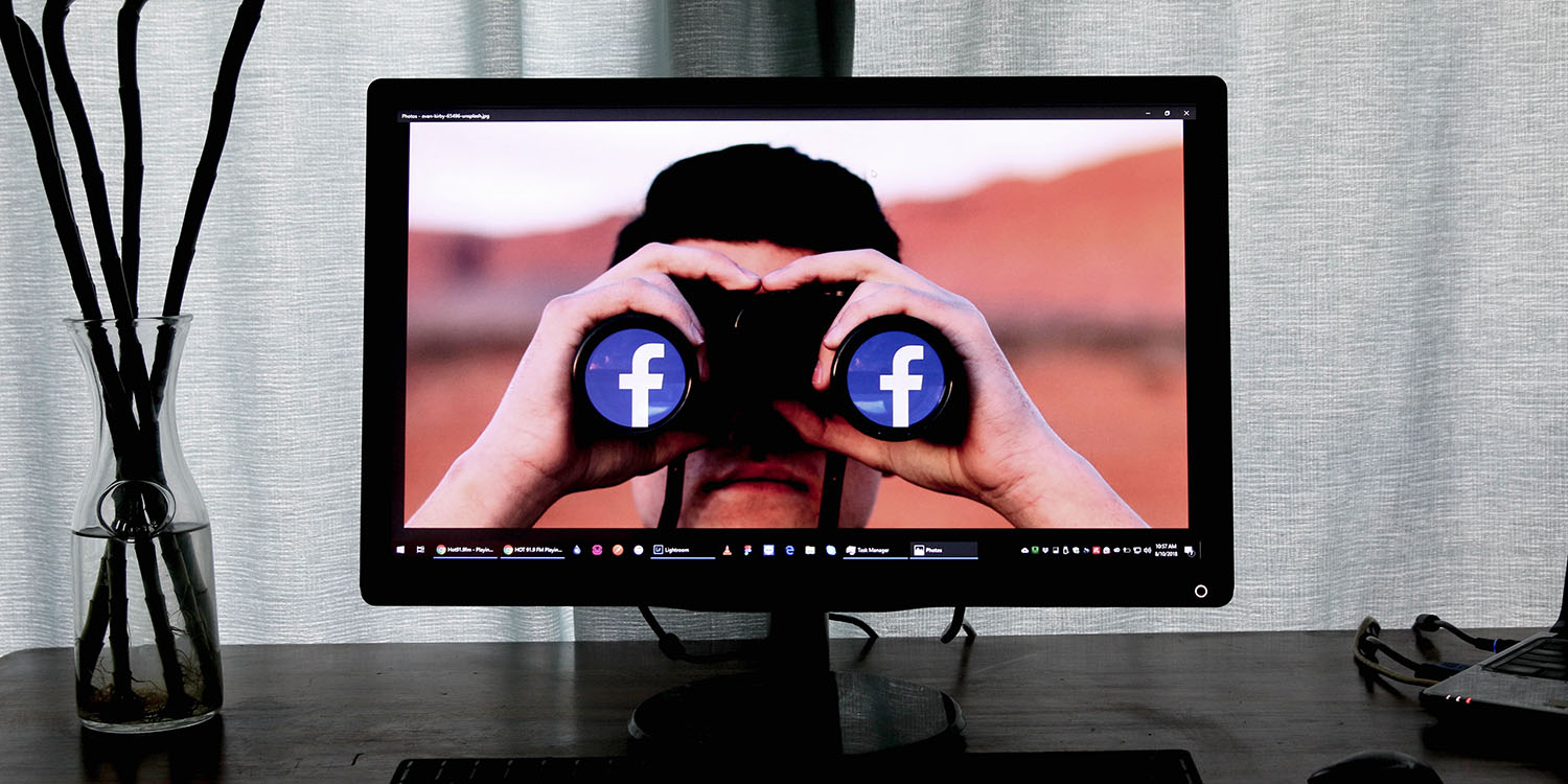 Facebook tracking | Facebook logo on binoculars