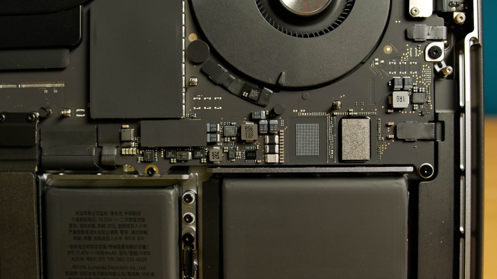 A single NAND chip, of the two that make up the MacBook Pro's SSD, on this side of the motherboard.