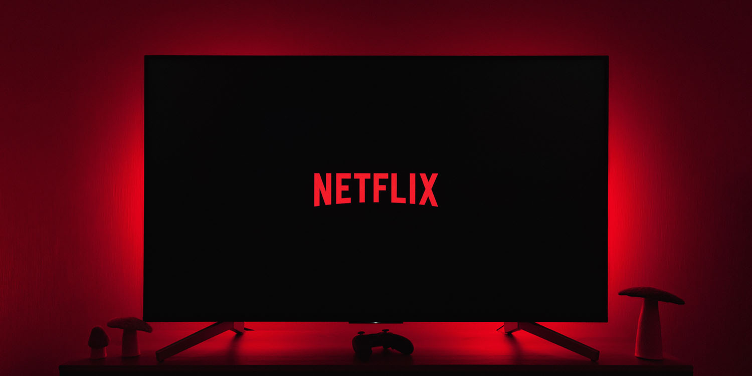 Netflix games TV | Netflix logo on TV in darkened room
