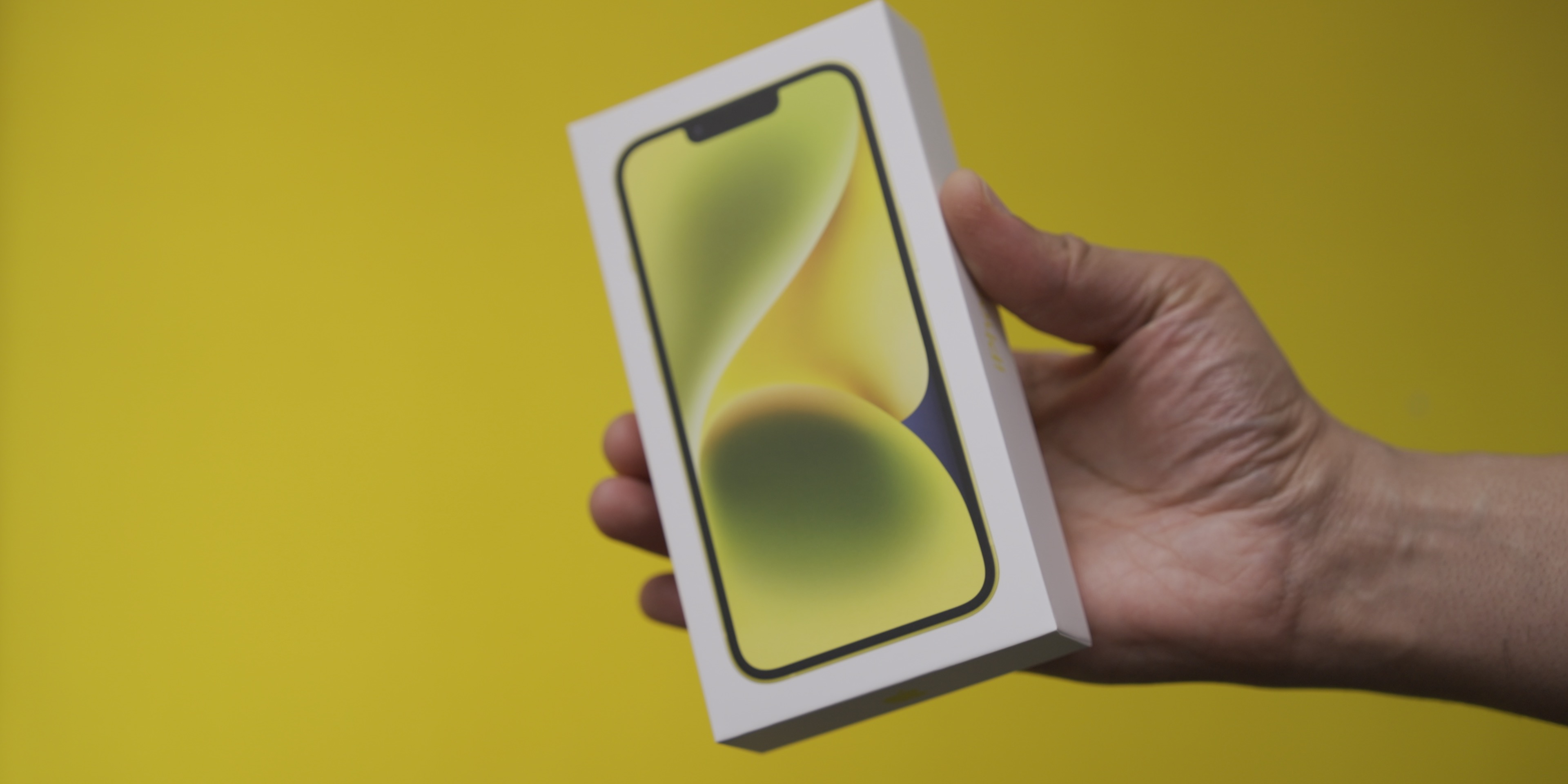 Download the new yellow iPhone 14 wallpaper right here
