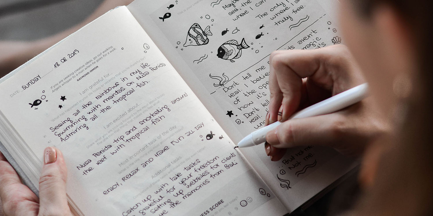 Apple journaling app | Woman writing in a journal