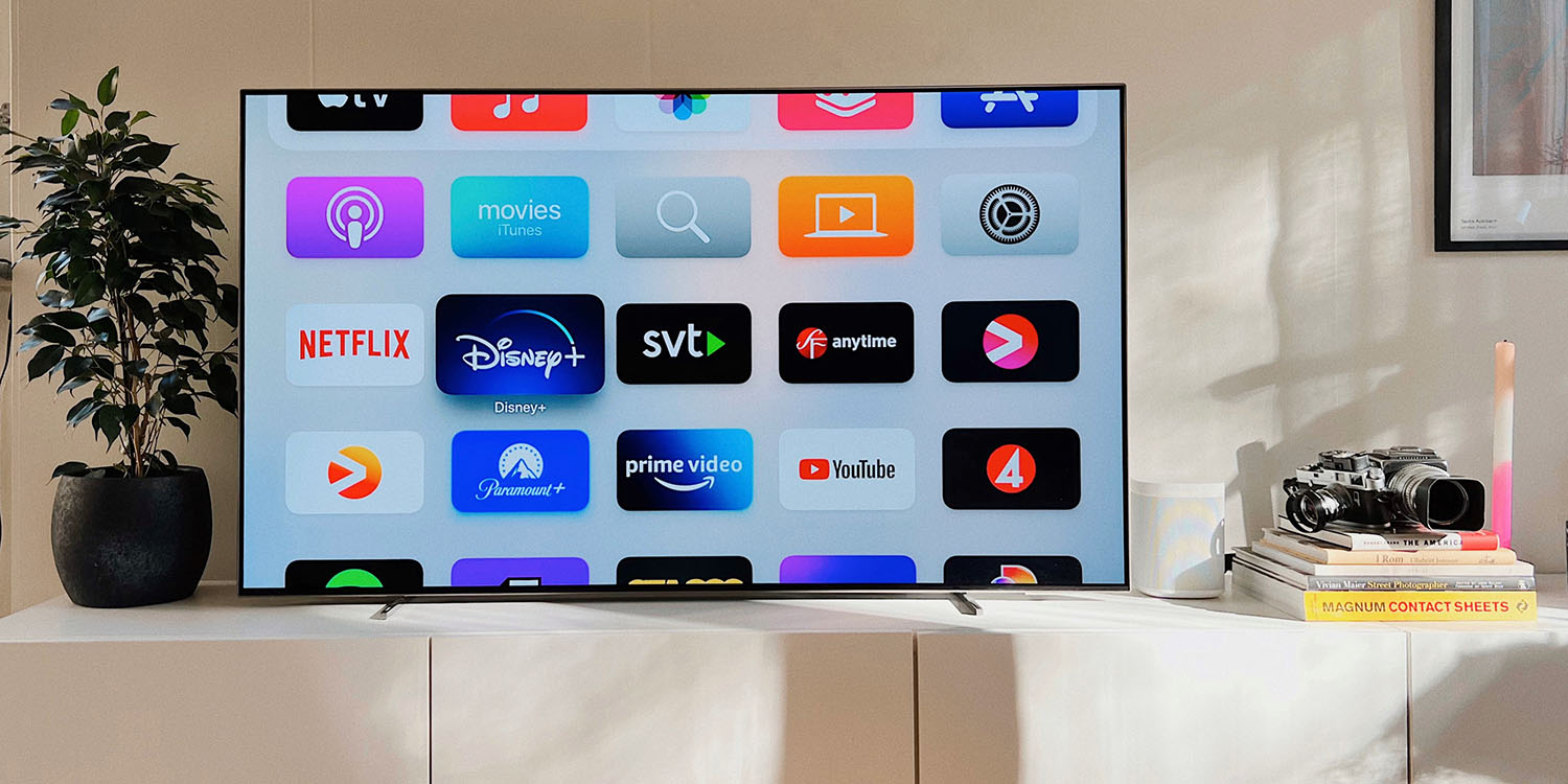 Streaming TV services | Apple TV apps shown on modern flatscreen