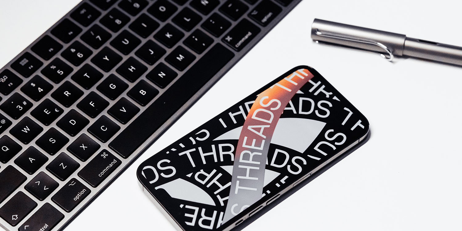 Threads for web this week | App on iPhone, next to Mac keyboard