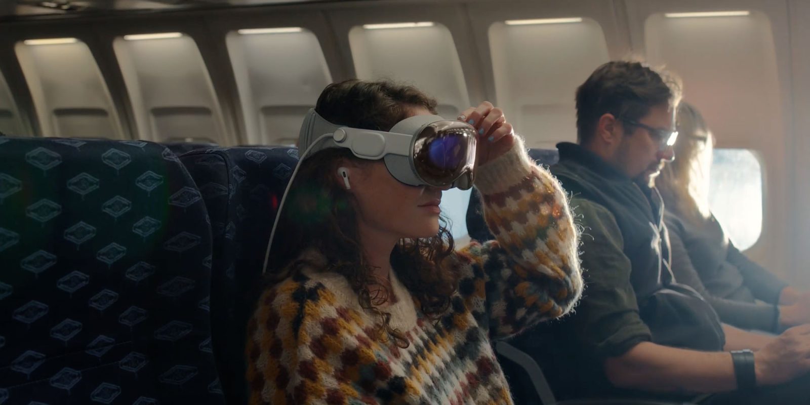 Vision Pro apps | Apple promo image on a plane