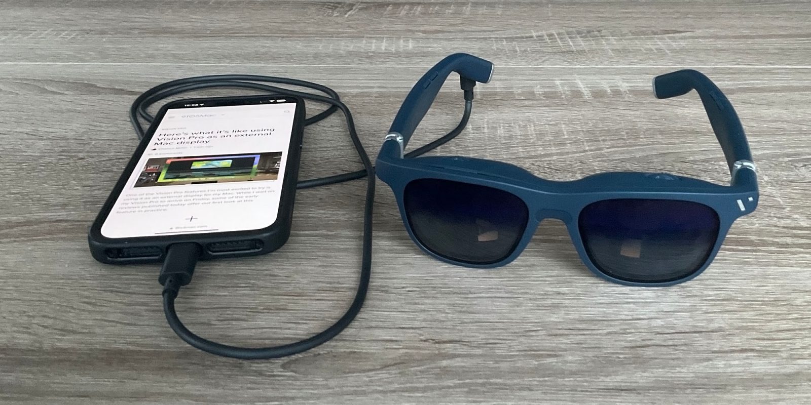 Viture One XR glasses connected to an iPhone 15 Pro Max