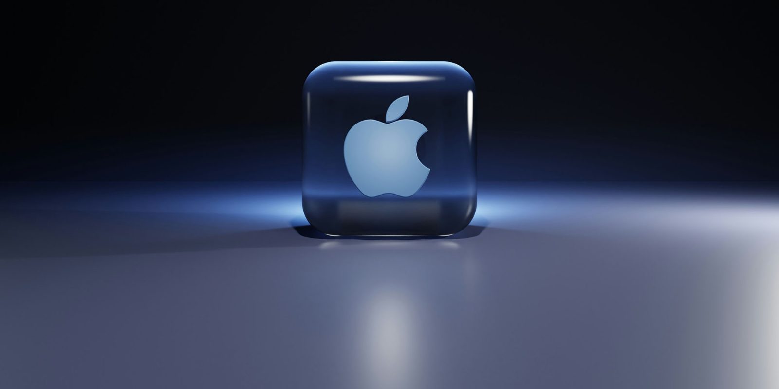Apple bought 30+ AI startups last year | Apple logo in glass cube