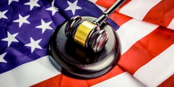 Judge in Apple antitrust case steps down | Court gavel and US flag