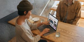 Touchscreen Macs | Woman touching laptop screen