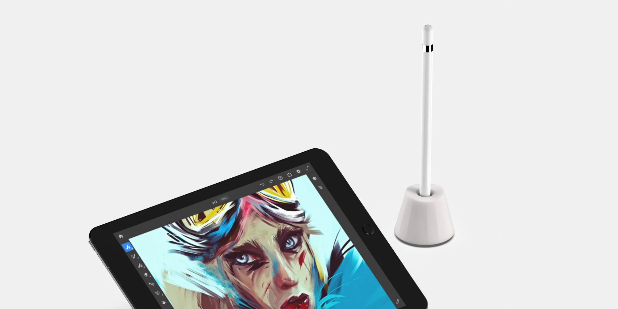 Apple Pencil silicone stand next to an iPad
