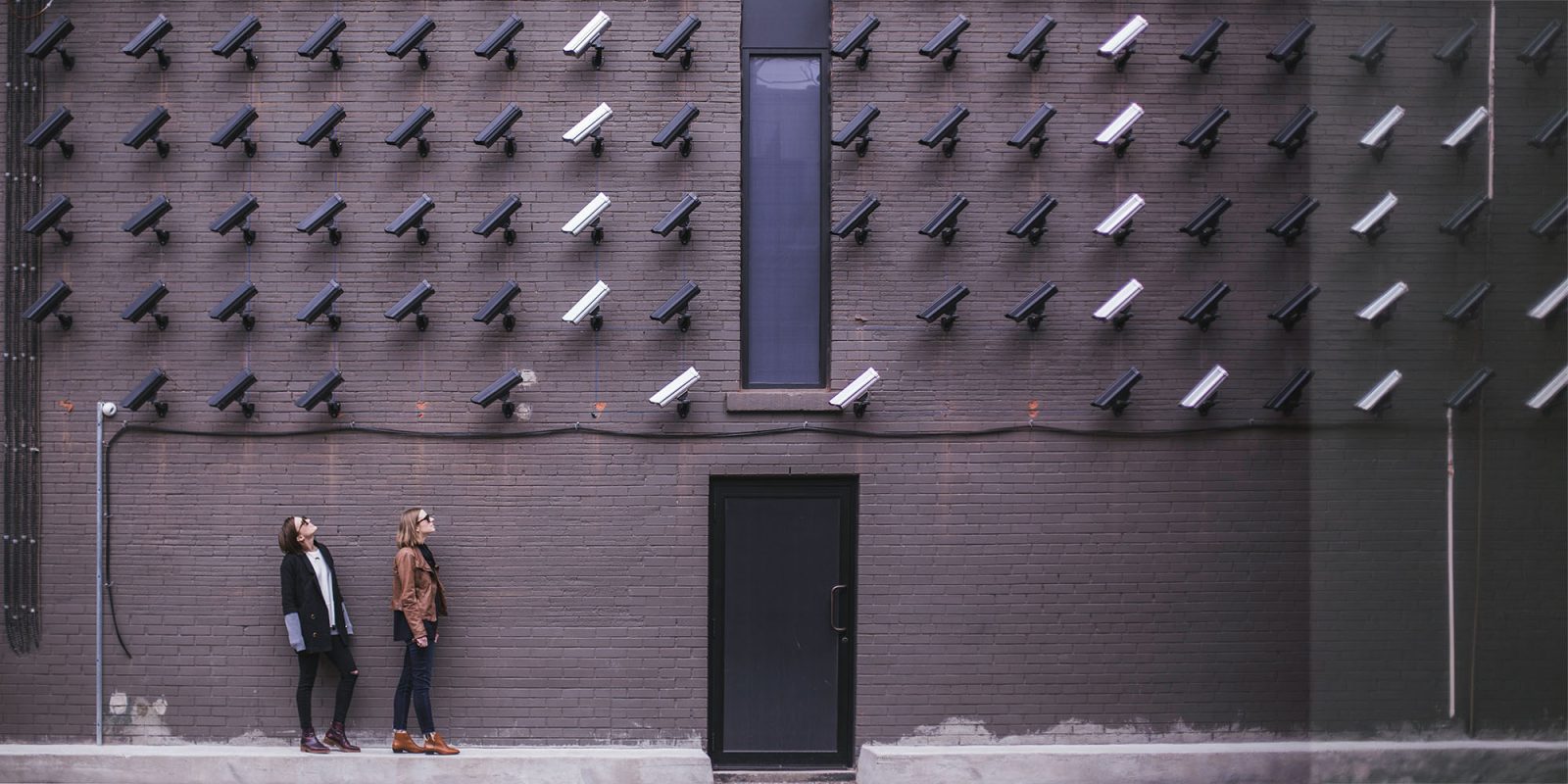 Apple Intelligence privacy | Wall of CCTV cameras
