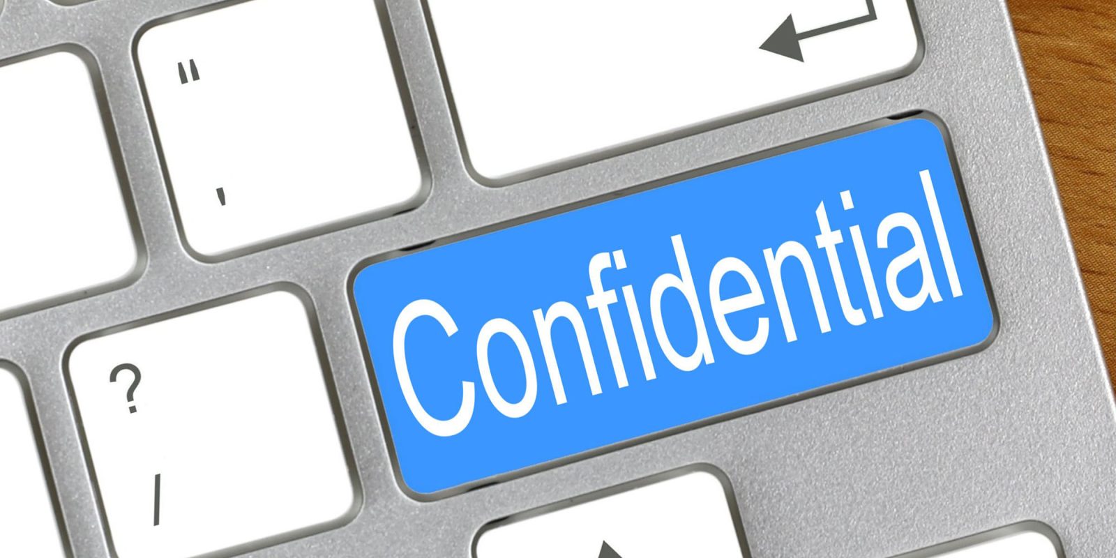 Confidential Apple data revealed by antitrust reports | Apple keyboard with 'Confidential' key