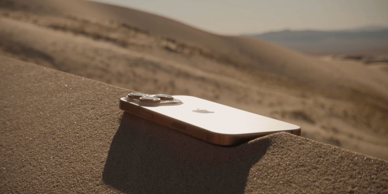 Deep dive into the iPhone 16 Pro cameras | Desert colored iPhone photographed in an actual desert