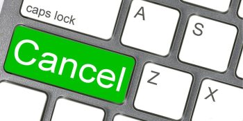 Federal 'click to cancel subscriptions' rule is ratified | Keyboard with large green Cancel key