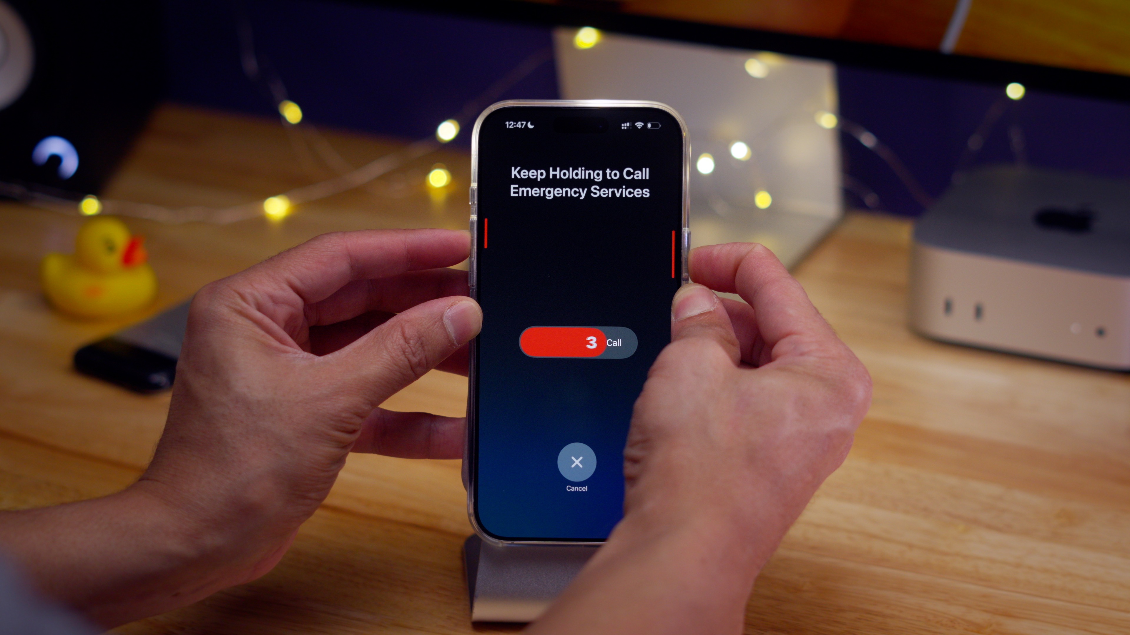 Invoking Emergency SOS iPhone 16 by long-pressing volume and Side buttons