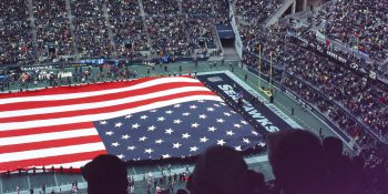 Siri hilariously failed Super Bowl test, getting 38 out of 58 wrong | Giant US flag on the field