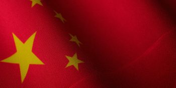 Five VPN apps in the App Store had links to Chinese military | Close-up of a Chinese flag