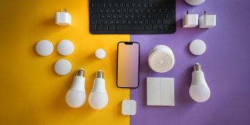 Setting up smart home gadgets to get easier with tap-to-pair and multi-device QR codes | A range of smart home devices on a colorful background