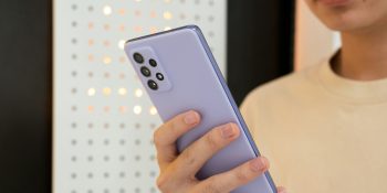 Simply telling your smart home what you want is another way Apple risks falling behind in AI | Close-up of someone speaking to a Samsung phone