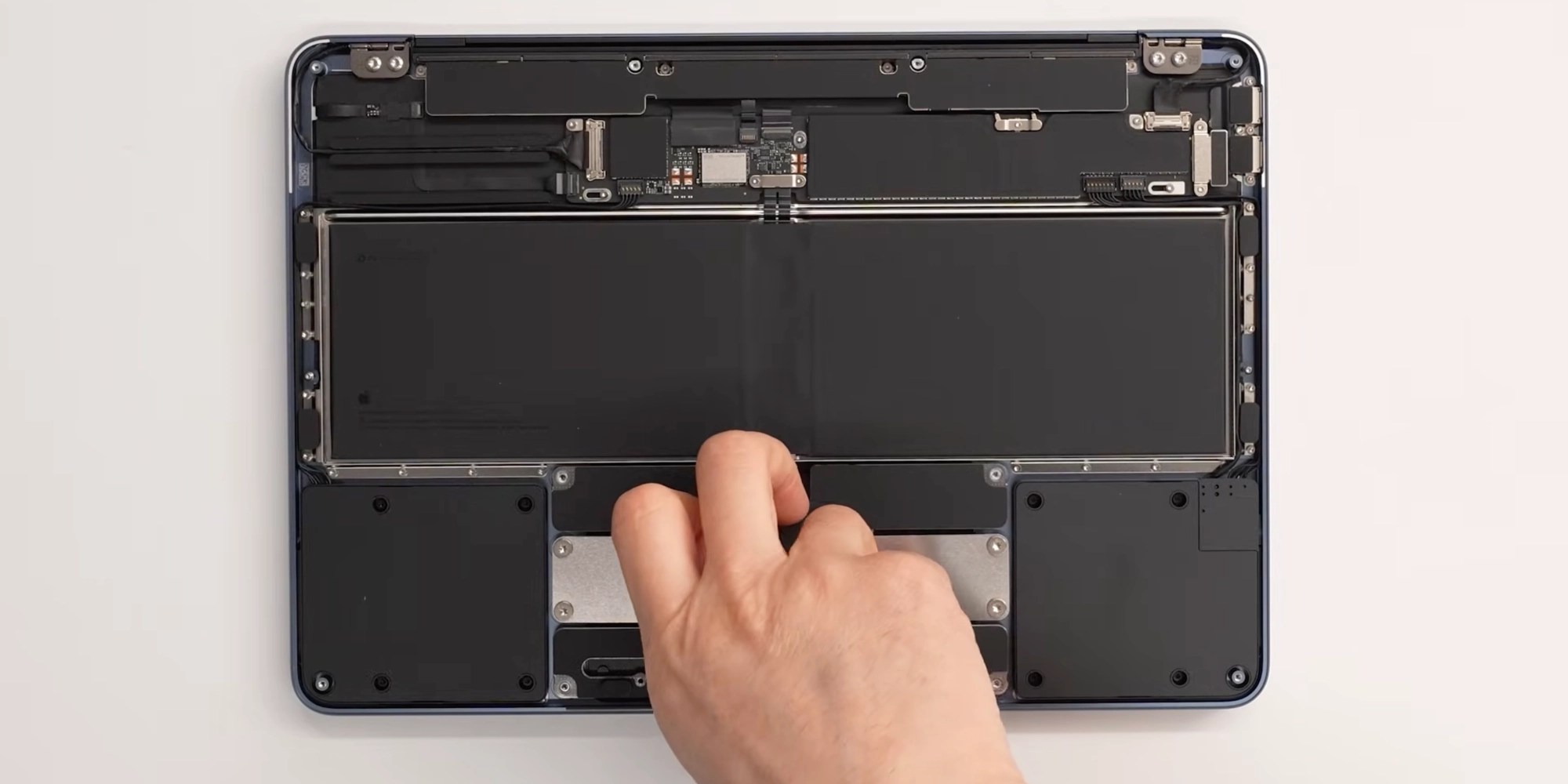 Inside MacBook Neo shows a little computer and a lot of&hellip;