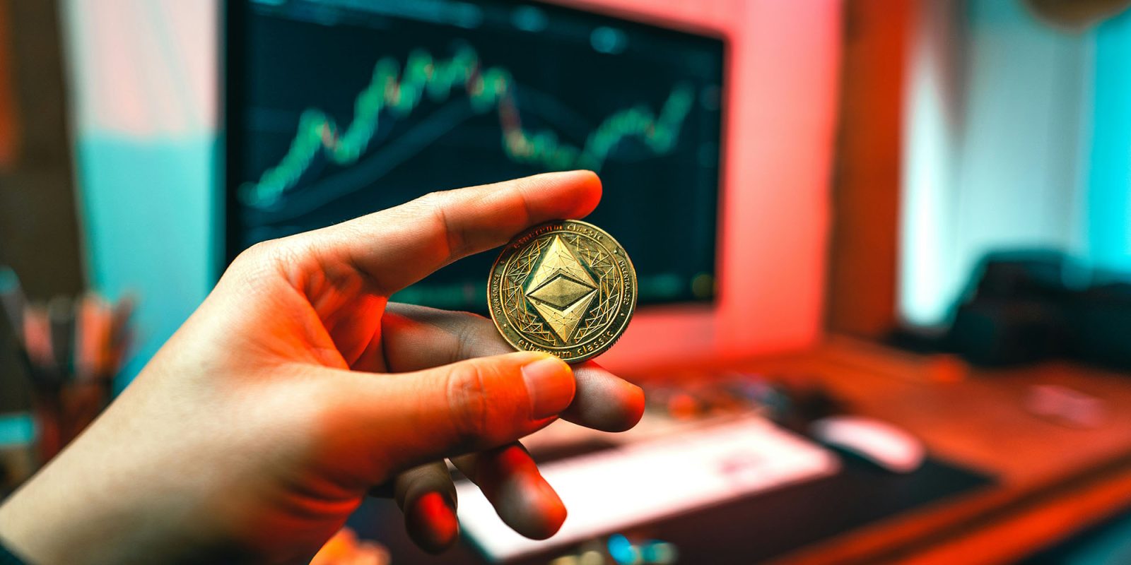 Claude Code AI finds a cryptominer on a Mac – says it didn't put it there | Stock photo shows an Ethereum coin being held up in front of a Mac